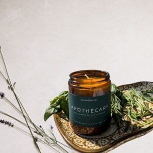 Apothecary candle with basil, lavender, rosemary, and cedarwood essential oils.
