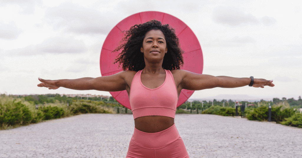Woman working wearing all pink gym wear