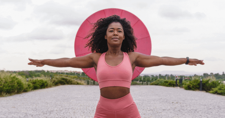 Woman working wearing all pink gym wear