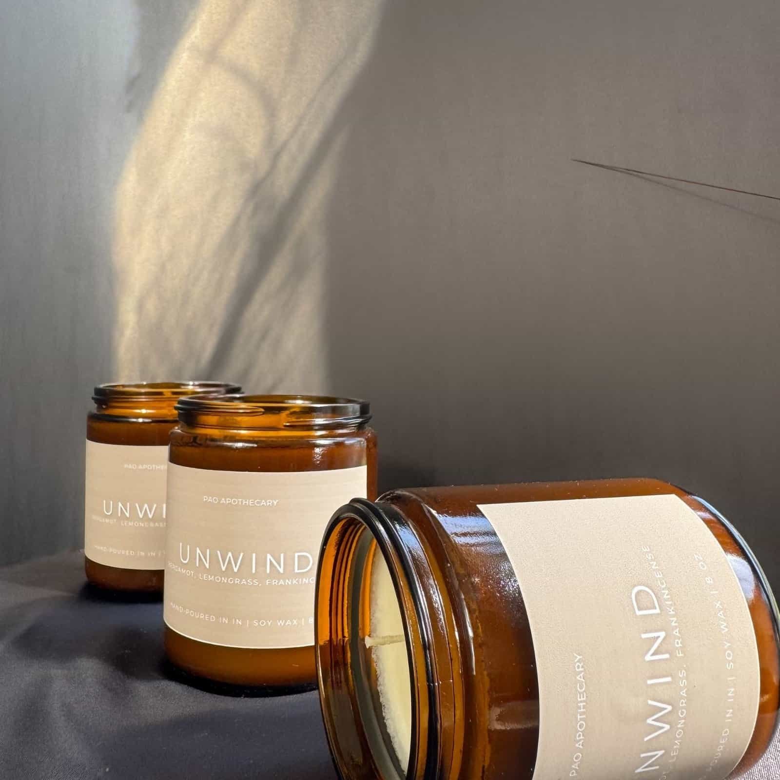 Unwind candle with lemongrass, bergamot, and frankincense